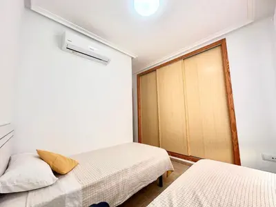 Cama o camas de una habitación en Adosado Mar Serena