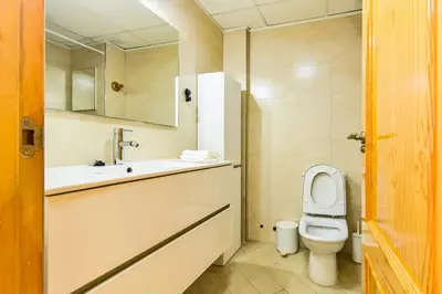 Un baño de Apartamento con Terraza, Piscina y Parking By Aloha Palma