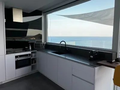 Una cocina o zona de cocina en Los Genoveses Penthouse