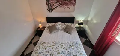 Cama o camas de una habitación en Chalet Athos, Ferienwohnung mit Pool,Dachterasse, Meer und Bergblick in San Juan de los Terreros