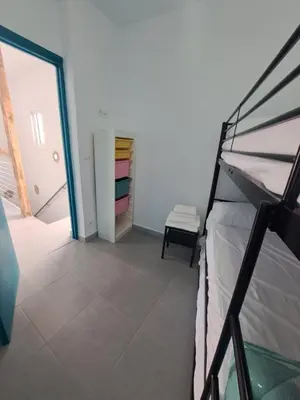 Cama o camas de una habitación en La Casita de Ana