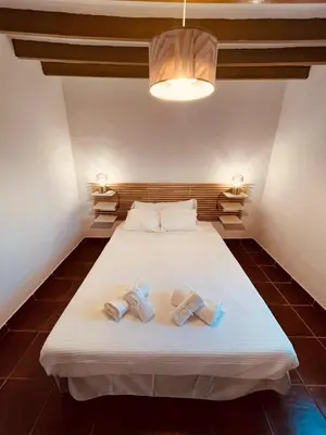 Cama o camas de una habitación en Apartamento Almeria Playa