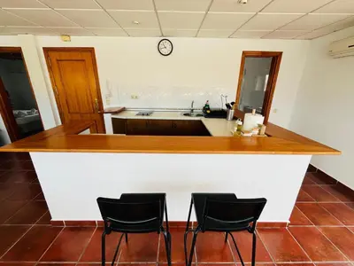 Una cocina o zona de cocina en Apartamento Almeria Playa