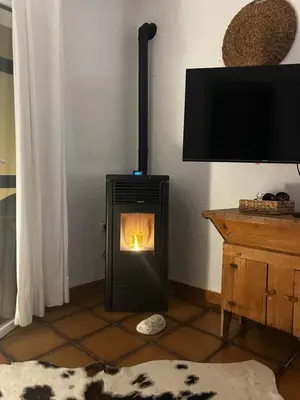 Una televisión o centro de entretenimiento en Casa Azul