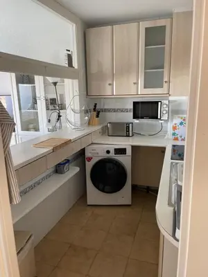 Una cocina o zona de cocina en Apartamento paseo Maritimo