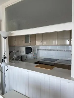 Una cocina o zona de cocina en Apartamento paseo Maritimo