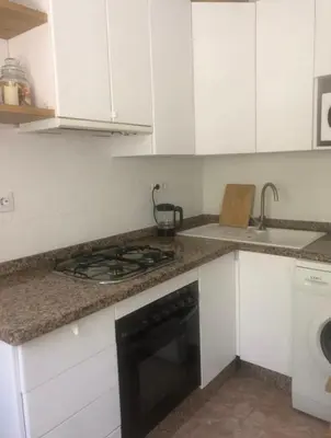 Una cocina o zona de cocina en Habitación privada LA ALCAZABA A TUS PIES