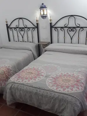 Cama o camas de una habitación en Cueva Abuelo Juan