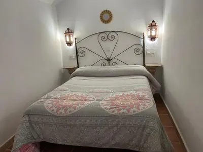Cama o camas de una habitación en Cueva Abuelo Juan