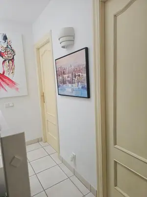 Una televisión o centro de entretenimiento en Casita Mare