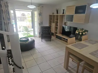 Una televisión o centro de entretenimiento en Casita Mare