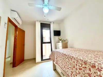 Cama o camas de una habitación en Céntrico Apartamento a Pasos del Castillo y la Playa