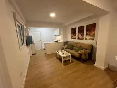 Una televisión o centro de entretenimiento en Premium Apartments Santaella
