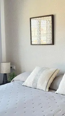 Cama o camas de una habitación en MAR AZUL Playa y Piscina 80 metros de la playa