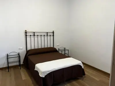 Cama o camas de una habitación en Pósito de Don Juan