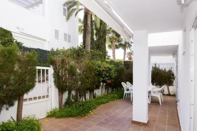 Jardín al aire libre en Vera Playa El Oasis Bajo con Jardin y Piscinas