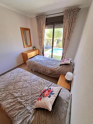 Cama o camas de una habitación en Casa Salinas con piscina privada en Vera Playa