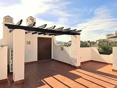 Un balcón o terraza de Casa Salinas con piscina privada en Vera Playa