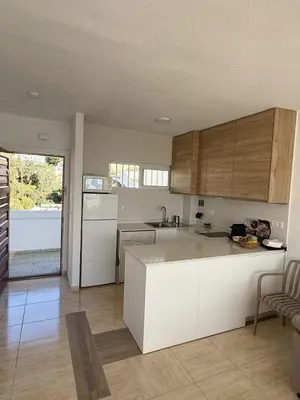 Una cocina o zona de cocina en Apto Torres 1ª Línea De Playa