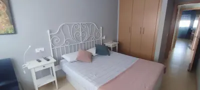 Cama o camas de una habitación en La Casina de Retamar