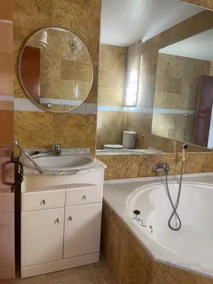 Un baño de Apartamento Nudista La Menara