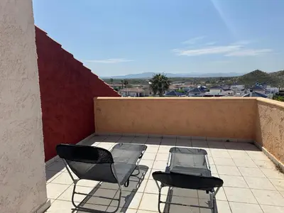 Un balcón o terraza de Apartamento Nudista La Menara
