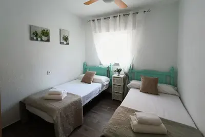 Cama o camas de una habitación en Arco suites, 2 Hab, a 150 metros de la playa y gran terraza