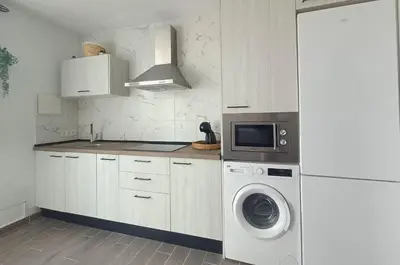 Una cocina o zona de cocina en Arco suites, 2 Hab, a 150 metros de la playa y gran terraza