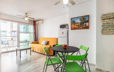 Una televisión o centro de entretenimiento en Lovely Apartment In Roquetas De Mar