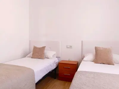 Cama o camas de una habitación en Cala Grande suites 3 hab, vistas al mar y terraza