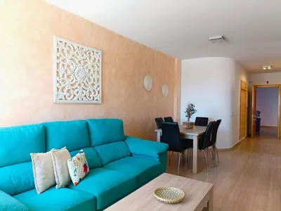 Zona de estar de Cala Grande suites 3 hab, vistas al mar y terraza
