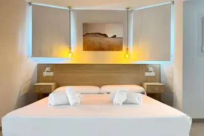 Cama o camas de una habitación en El Oasis de San José