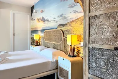 Cama o camas de una habitación en Apartamentos Julio Visconti