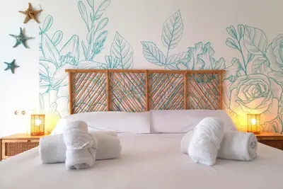 Cama o camas de una habitación en Apartamentos Julio Visconti