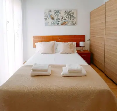 Cama o camas de una habitación en Cala Chica Suites 2 hab con vistas al mar y terraza
