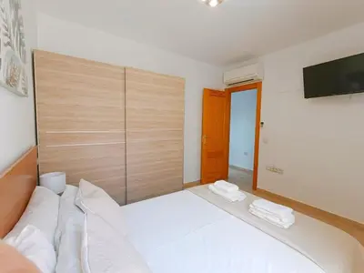 Cama o camas de una habitación en Cala Chica Suites 2 hab con vistas al mar y terraza