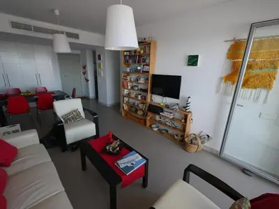 Una televisión o centro de entretenimiento en Apartamento Las Negras