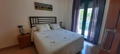 Cama o camas de una habitación en Apartamento Aguamarina