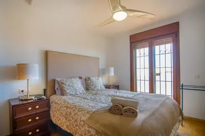 Cama o camas de una habitación en Mediterranea 15 Plaomares, 2 dormitorios 2 baños
