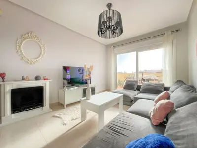 Una televisión o centro de entretenimiento en Ático 1º Linea - Beach Penthouse Roquetas de Mar