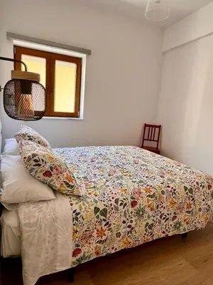 Cama o camas de una habitación en Placeta Serna El Capricho