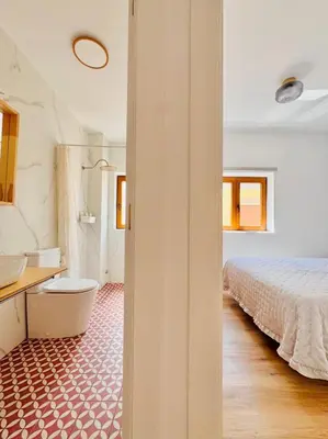 Cama o camas de una habitación en Placeta Serna El Capricho