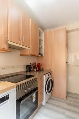 Una cocina o zona de cocina en ATP La Rambla Pintor a 5 minutos Plaza de Toros y Centro de Almería - Wifi Gratis!