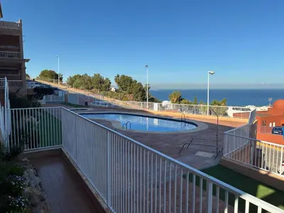 Piscina en o cerca de Golf Marina de la Torre con vistas al mar