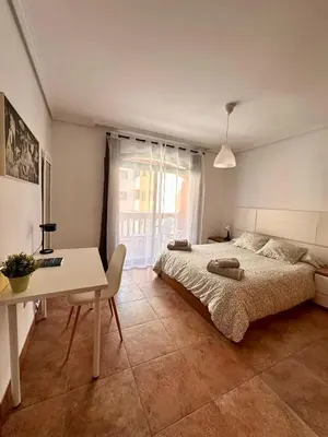 Cama o camas de una habitación en Apartamento Vivaldi