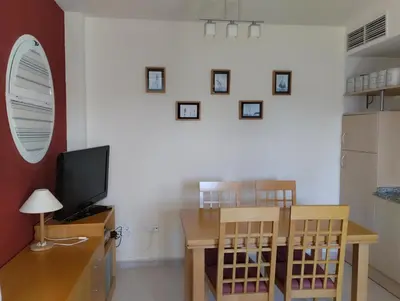 Una televisión o centro de entretenimiento en Apartamento Vera-playa