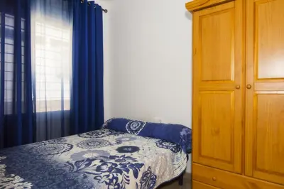Cama o camas de una habitación en Alma de Playa