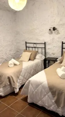 Cama o camas de una habitación en Bike Cueva Gorafe