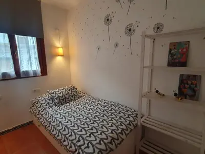 Cama o camas de una habitación en El capricho de Trevélez