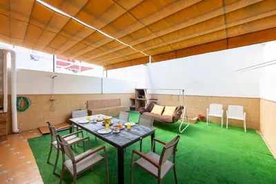 Zona de estar de Milan 5 Adosado familiar con jardín